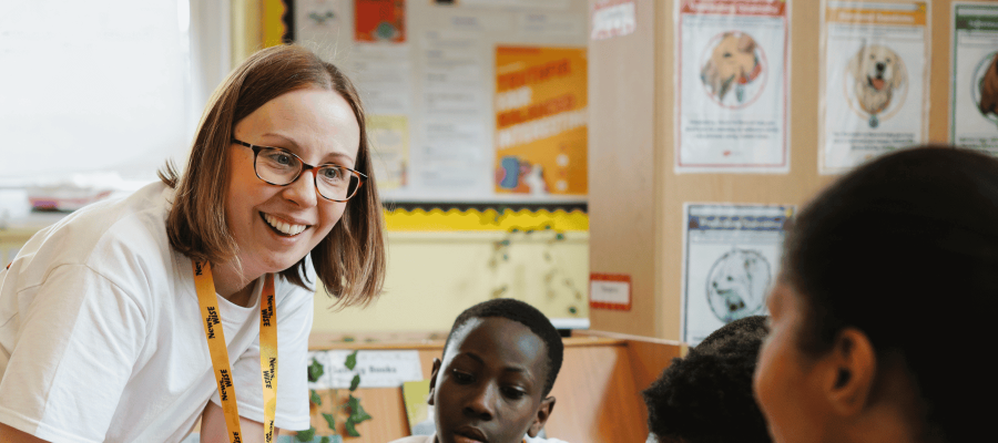 newswise-teacher-with-students-2025-(1).png